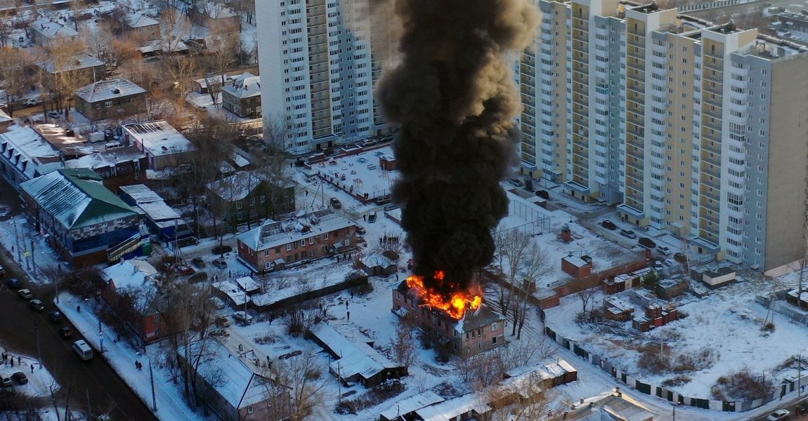 building catches fire after drone crash